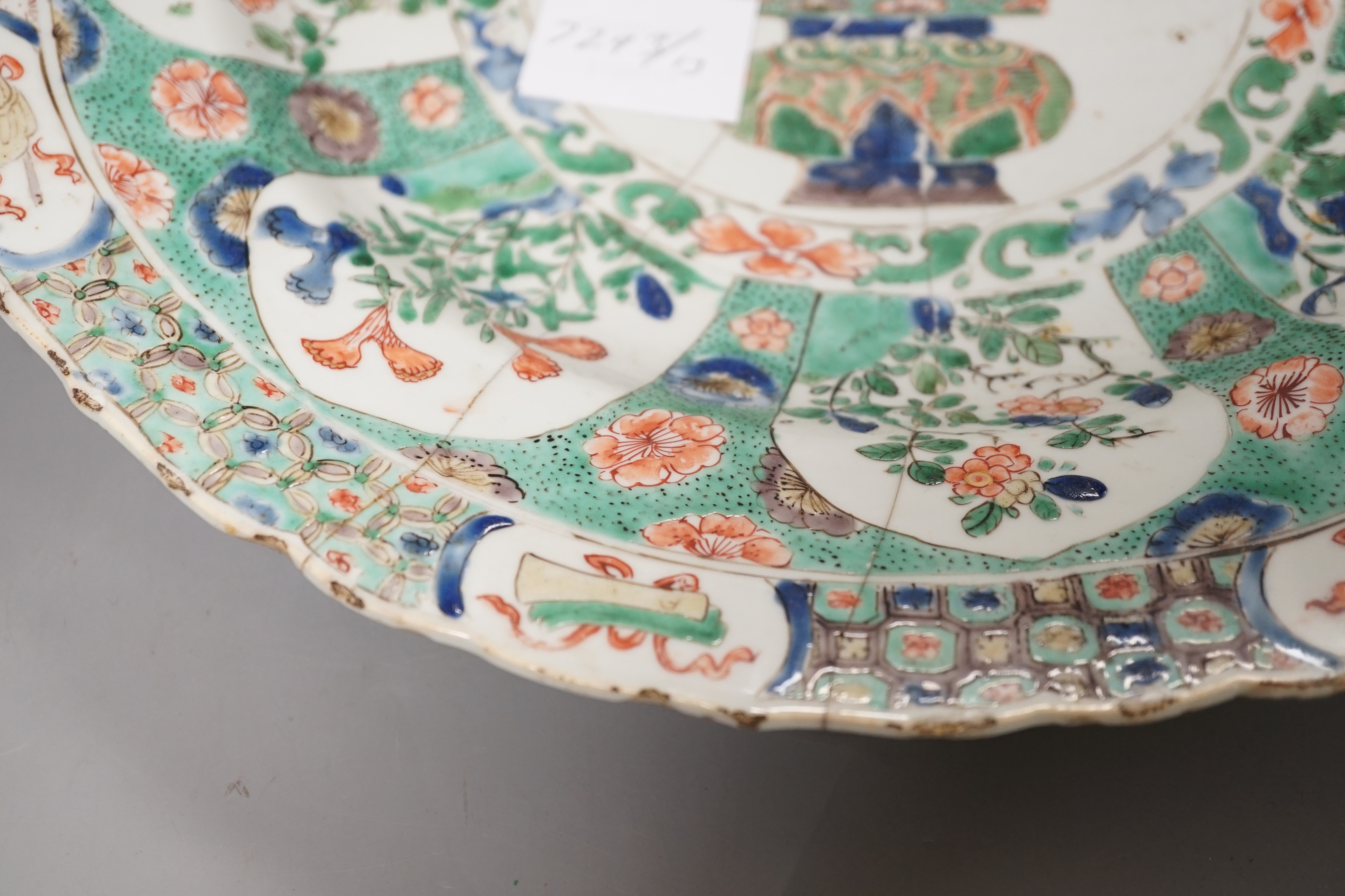 A Chinese Kangxi famille verte dish (repaired), 36cms diameter